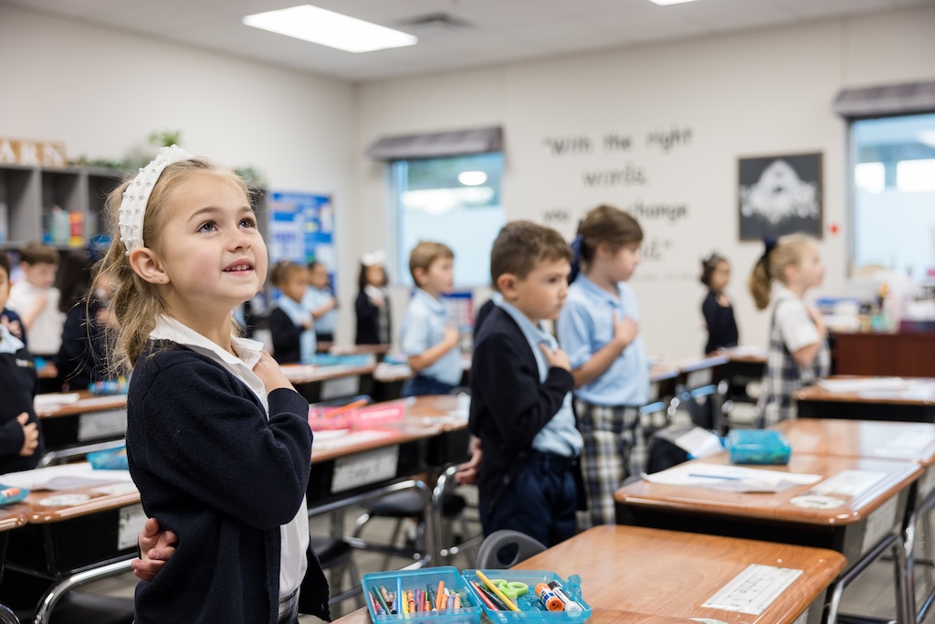 Lower School students reciting the Pledge of Allegiance at Great Hearts Western Hills